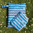 Blümchen Geschenkset Wickelunterlage Wetbag PUL mit Zip WAVE